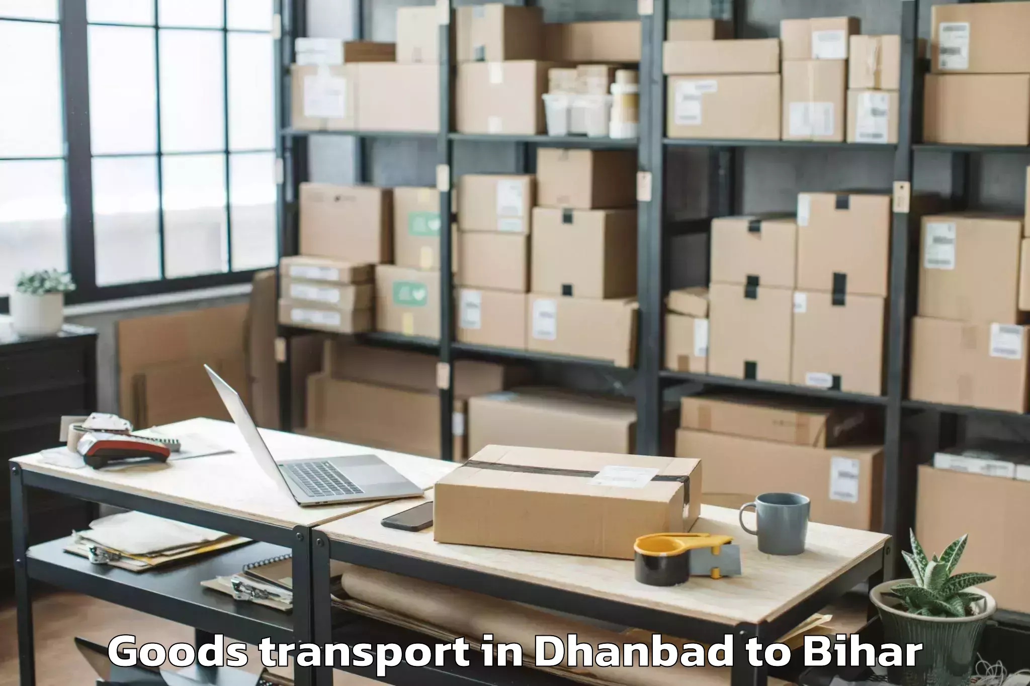 Easy Dhanbad to Ghanshampur Goods Transport Booking